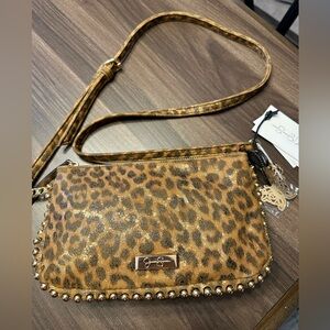 NWT Jessica Simpson leopard crossbody bag with butterfly charm